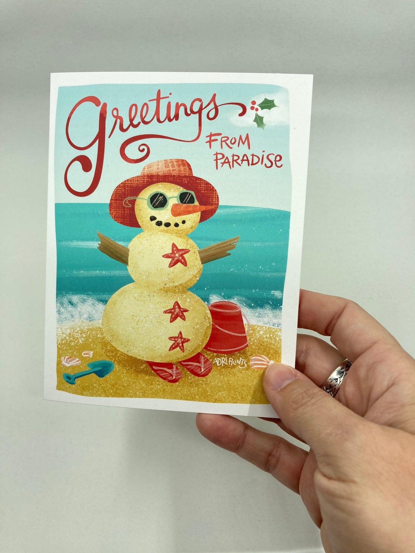 Sandy Snowman Greetings from Paradise, eco-friendly boxed cards 10 pack, art by Adriana Bergstrom