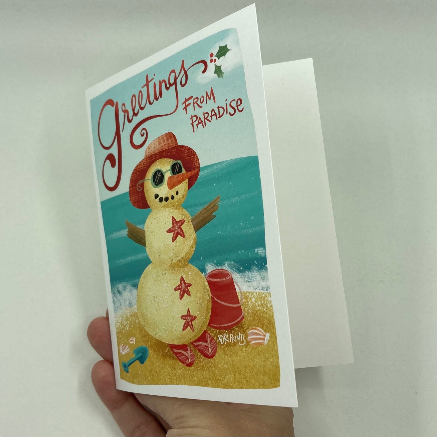 Sandy Snowman Greetings from Paradise, eco-friendly boxed cards 10 pack, art by Adriana Bergstrom