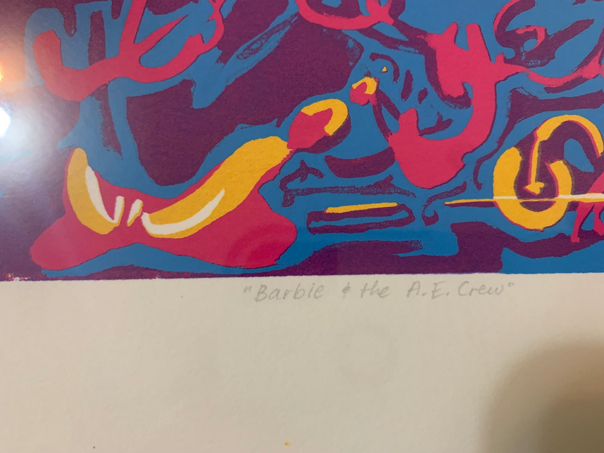 close up of the title of this artwork Barbie and the A.E. Crew